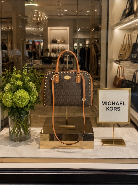 Michael Kors Handbags - Michael Kors Brown Monogram Satchel with Tan Trim and Studs